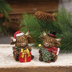 Resin Sitting Christmas Highland With Hat - 2 Asstd.