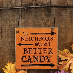 The Neighbors Give Out Better Candy Distressed Wooden Hanger