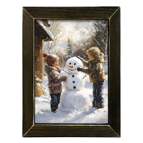 Building A Snowman Framed Print - 12x16